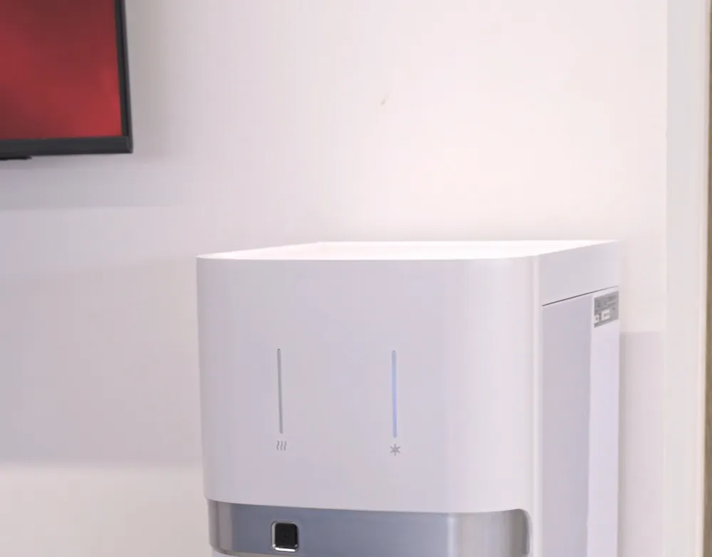 Acqua Fresca bottleless cooler installed against a clean white wall