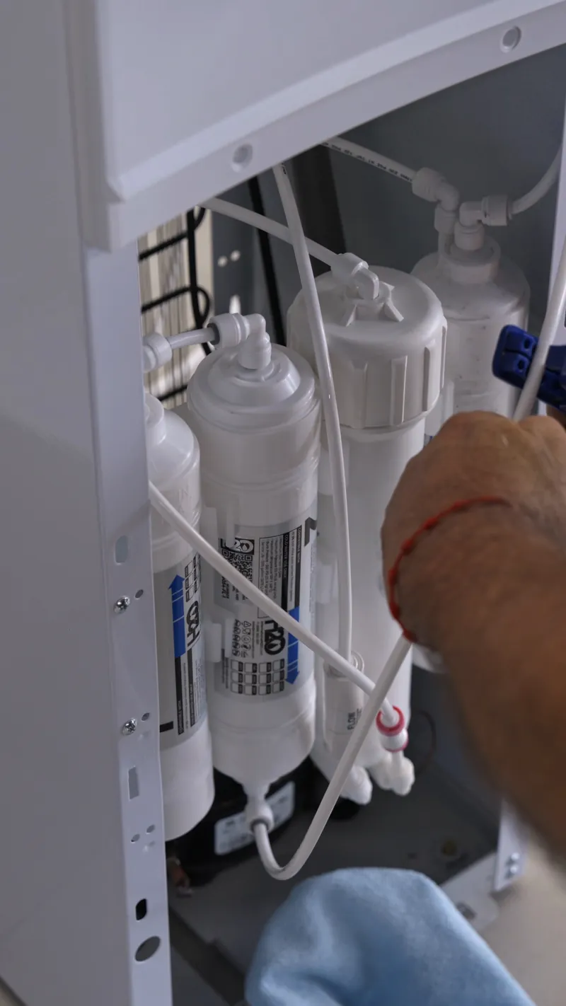 Service step for a bottleless water cooler